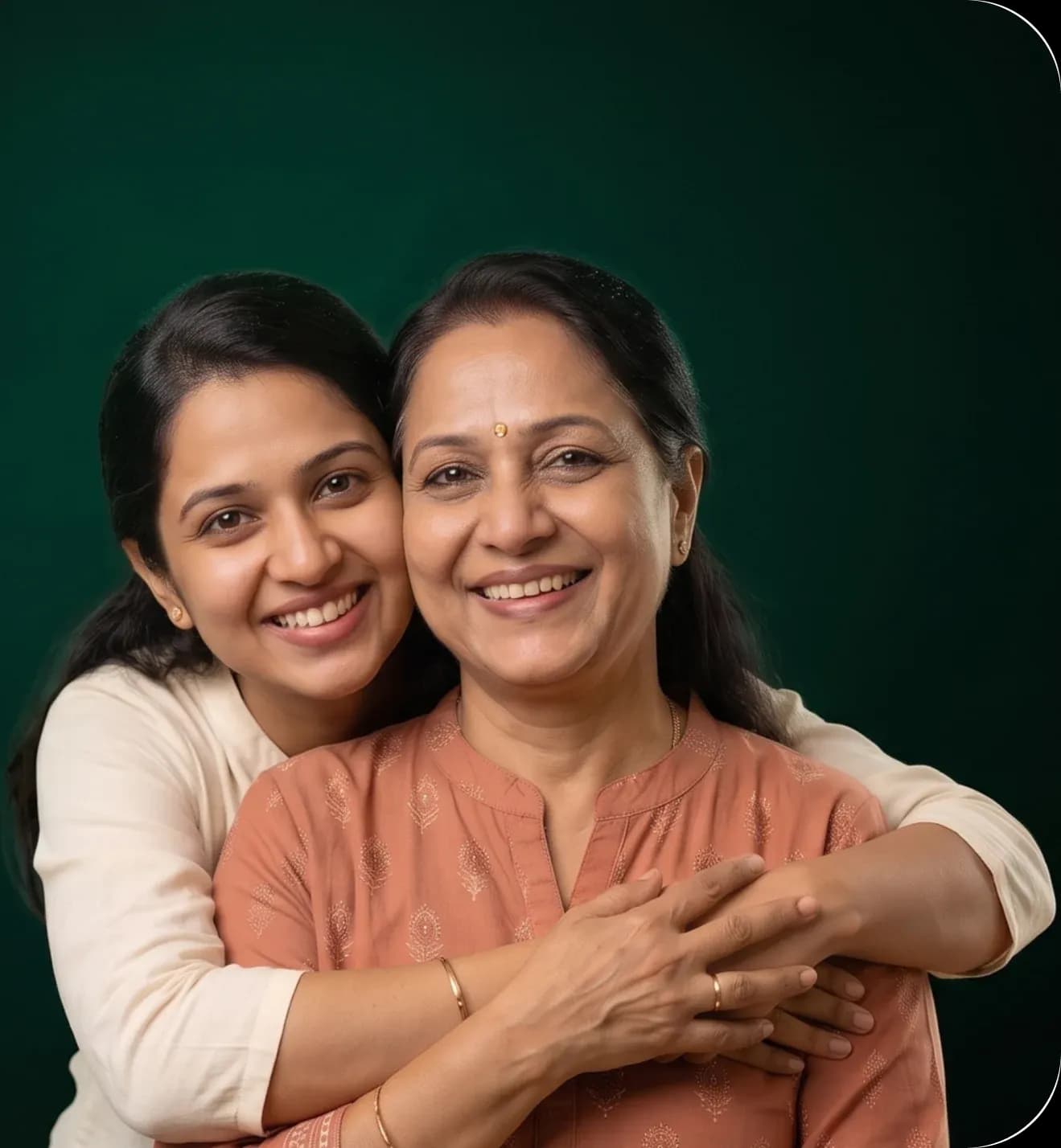 Mother and daughter smiling together